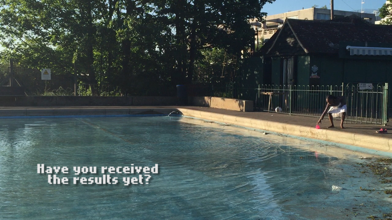 Text appears over a swimming pool